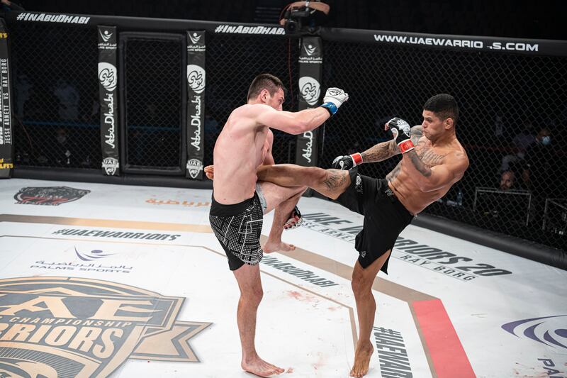 Handesson Ferreira, right, lands one on Amiran Gogoladze on the way to winning their welterweight contest on the UAE Warriors 20 card in Abu Dhabi.