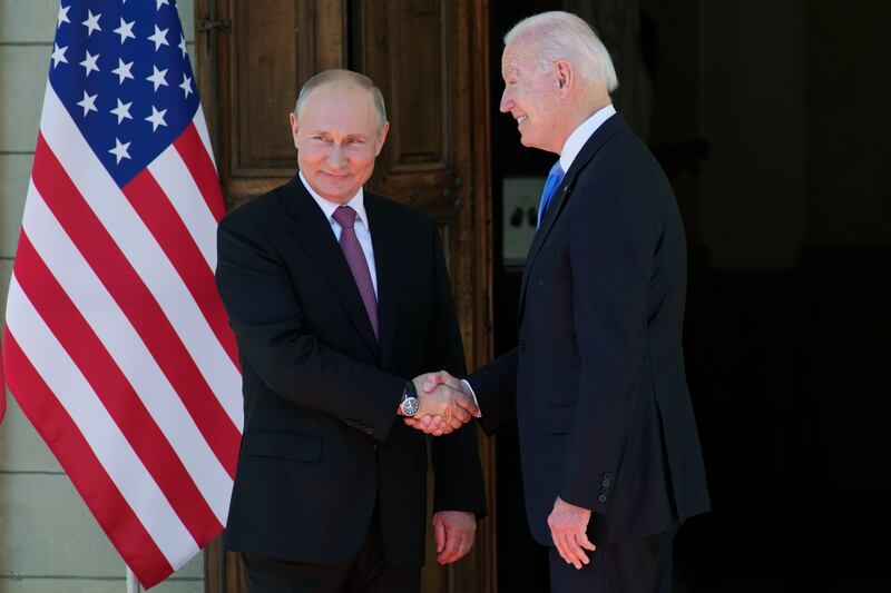 Russian President Vladimir Putin and US President Joe Biden shake hands during their meeting at the Villa la Grange in Geneva, Switzerland. AP Photo
