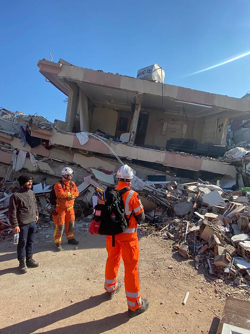 Undated handout photo issued by Scottish Fire and Rescue Service of firefighters working at the earthquake scene in Turkey. They joined the 77-strong UK rescue team dispatched to the two countries after massive tremors left buildings collapsed and tens of thousands of people dead. Issue date: Wednesday February 22, 2023.