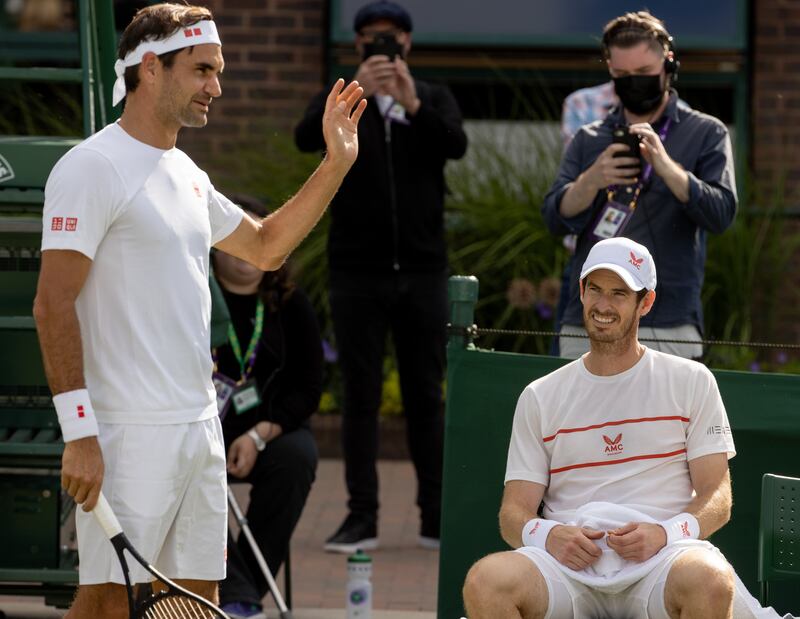 Roger Federer and Andy Murray at a practice session at The All England Club. PA