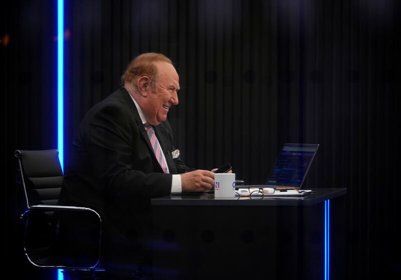 Presenter Andrew Neil prepares to go to air during the launch event for new TV channel GB News. AP