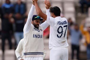Cricket - ICC World Test Championship Final - India v New Zealand - Rose Bowl, Southampton, Britain - June 20, 2021 India's Ishant Sharma celebrates with Virat Kohli after taking the wicket of New Zealand's Devon Conway Action Images via Reuters / John Sibley