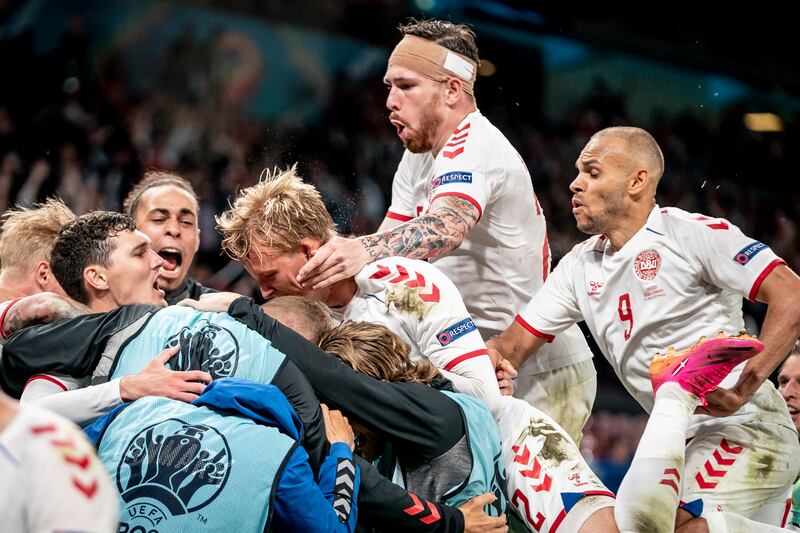 Danish players celebrate. EPA