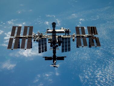 FILE - This undated handout photo released by Roscosmos State Space Corporation shows the International Space Station (ISS) during its fly. Russia's space corporation Roscosmos said Monday Dec. 19, 2022 that a coolant leak from a Russian space capsule attached to the International Space Station doesn't require evacuation of its crew, but held the door open for launching a replacement capsule if needed. (Roscosmos State Space Corporation via AP, File)