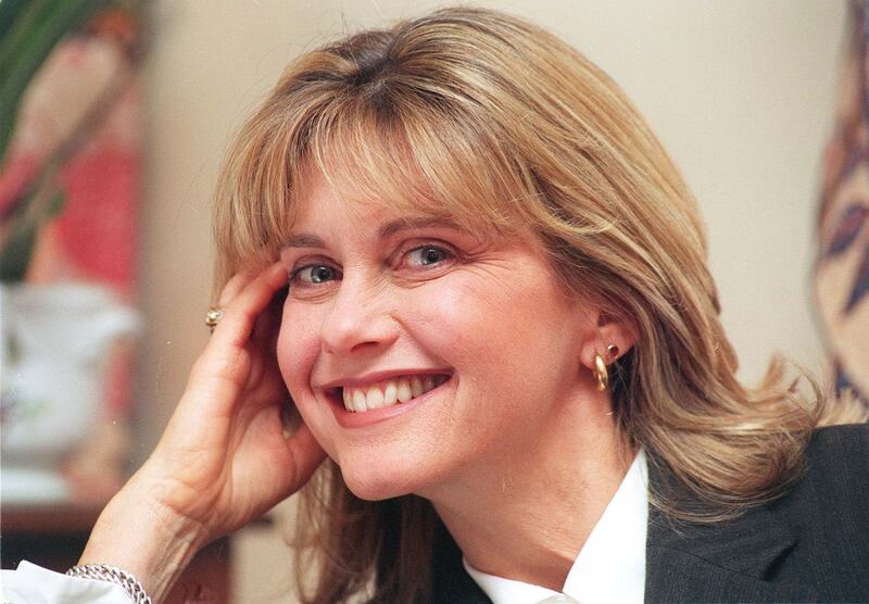 File photo dated 19/07/96 of Olivia Newton-John, pictured in London. Dame Olivia Newton-John has died at the age of 73, her widower has confirmed. The British-born singer died "peacefully" at her ranch in Southern California on Monday morning, surrounded by family and friends. Issue date: Tuesday August 9, 2022.