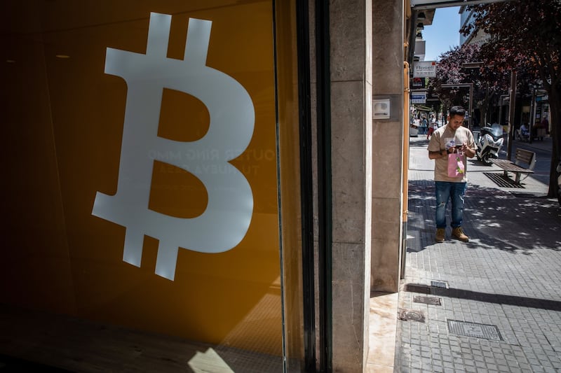 A Bitcoin logo inside a BitBase cryptocurrency exchange in Barcelona, Spain, on Monday, May 16, 2022.
