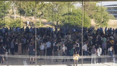 Attendees arrive at the Steve Jobs Theater ahead of an event at Apple Park campus in Cupertino, California, US, on Wednesday, Sept. 7, 2022. At a presentation dubbed “Far Out,” Apple is set to unveil the iPhone 14 line, a fresh slate of smartwatches and new AirPods. Photographer: Nic Coury/Bloomberg