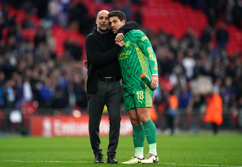 Manchester City manager Pep Guardiola and goalkeeper Stefan Ortega, who has only played 524 minutes in the Premier League this season but is being hailed as the man who sealed the title for Manchester City. PA Wire