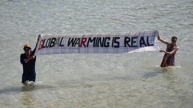 Extinction Rebellion protesters in the sea on the final day of the G7 summit in the UK. Bloomberg