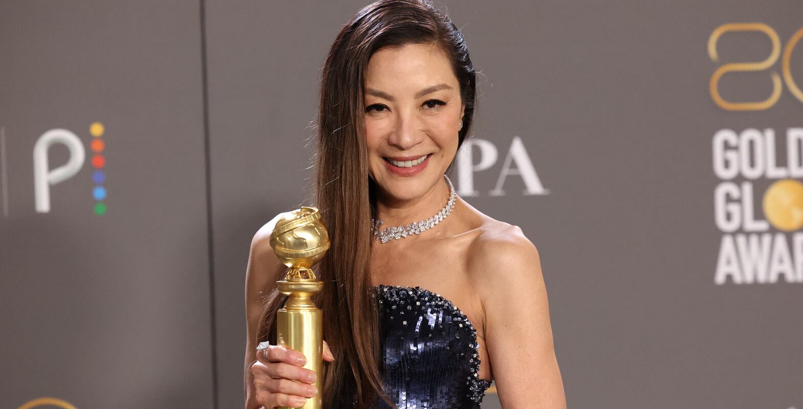 Michelle Yeoh poses with her award for Best Actress in a Musical or Comedy Motion Picture for "Everything Everywhere All at Once"  at the 80th Annual Golden Globe Awards in Beverly Hills, California, U. S. , January 10, 2023.  REUTERS / Mario Anzuoni