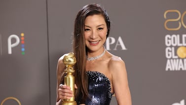 Michelle Yeoh poses with her award for Best Actress in a Musical or Comedy Motion Picture for "Everything Everywhere All at Once"  at the 80th Annual Golden Globe Awards in Beverly Hills, California, U. S. , January 10, 2023.  REUTERS / Mario Anzuoni