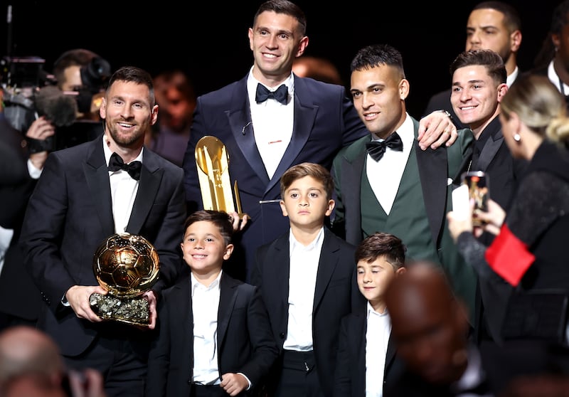 Ballon d'Or 2023 winner Argentine international Lionel Messi (L) is joined on stage by his three sons and his Argentine teammates goalkeeper Emiliano Martinez, winner of the Yashin Trophy for best goalkeeper, Lautaro Martinez (2R) and Julian Alvarez (R) during the Ballon d'Or 2023 ceremony at the Theatre du Chatelet in Paris, France, 30 October 2023.   EPA / MOHAMMED BADRA