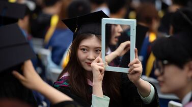 Graduates, including students who could not attend last year due to the coronavirus disease (COVID-19) pandemic, attend a graduation ceremony at Central China Normal University in Wuhan, Hubei province, in China on June 13.  Picture taken June 13. Reuters