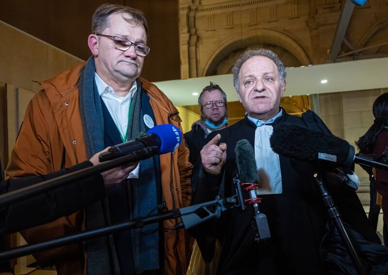 President of the victims association 'Life for Nice' Jean-Hubler (L) and French lawyer Mehana Mouhou (C) talk to the press, next to a temporary courtroom after the verdict in the Nice truck attack trial case, at the 'Palais de Justice' courthouse in Paris, France, 13 December 2022.  On 14 July 2016, 86 people were killed and hundreds injured after a truck plowed through the crowd on the Promenade des Anglais during celebrations of Bastille Day in Nice.  The court sentenced defendants to serve from 2 to 18 years in prison.   EPA / CHRISTOPHE PETIT TESSON