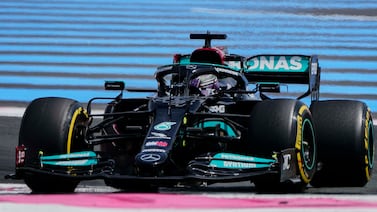 Mercedes driver Lewis Hamilton of Britain steers his car during the first free practice for the French Formula One Grand Prix. AP Photo