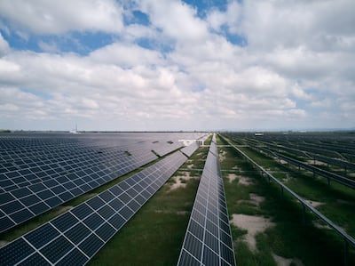 Photovoltaic panels at a solar power plant. Photographer: Mauricio Palos / Bloomberg