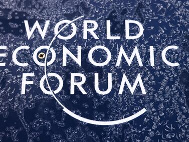 A frost-covered logo for the World Economic Forum (WEF) in Davos, Switzerland, on Monday, Jan.  16, 2023.  The annual Davos gathering of political leaders, top executives and celebrities runs from January 16 to 20. Photographer: Stefan Wermuth / Bloomberg