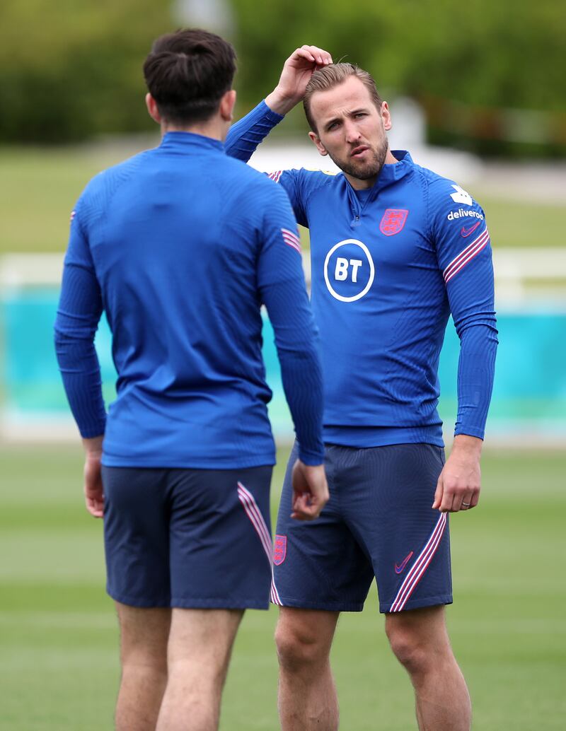 England's Harry Kane (right) and Harry Maguire during the training session. PA
