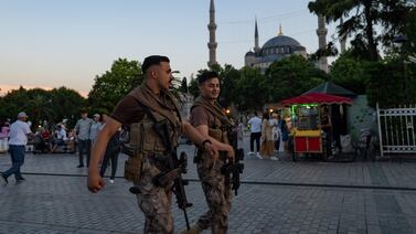 Turkish police officers patrolling in front of the Blue Mosque in Istanbul on Tuesday. AFP