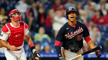 Washington Nationals' Juan Soto, right, reacts past Philadelphia Phillies catcher J. T.  Realmuto after flying out against pitcher Bailey Falter during the fourth inning of a baseball game, Tuesday, June 22, 2021, in Philadelphia.  (AP Photo / Matt Slocum)