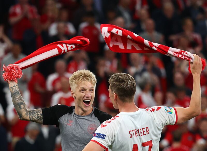 Denmark's Daniel Wass and Jens Stryger Larsen celebrate. Reuters