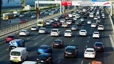Vehicles pass under a Salik toll gate on Sheikh Zayed Road in Dubai. AP
