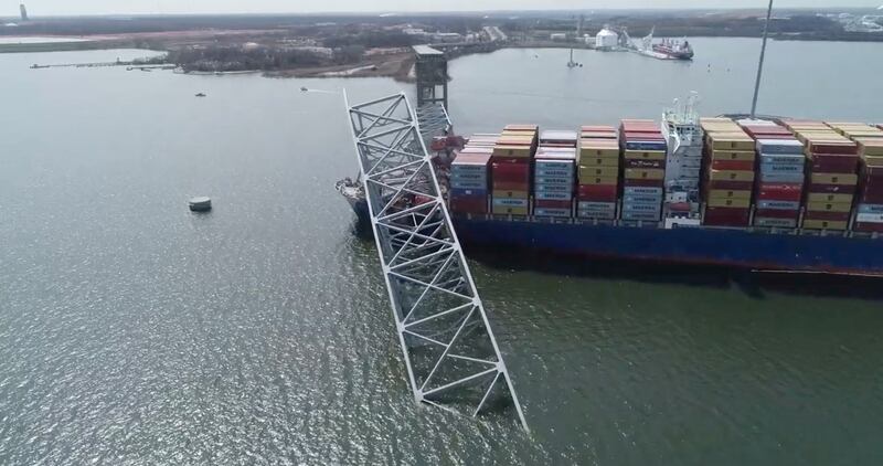 A drone view of the Dali cargo vessel, which crashed into the Francis Scott Key Bridge causing it to collapse, in Baltimore, Maryland, U. S. , March 26, 2024, in this still image taken from a handout video.  NTSB/Handout via REUTERS    THIS IMAGE HAS BEEN SUPPLIED BY A THIRD PARTY.  MANDATORY CREDIT