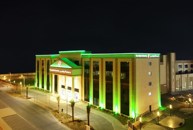 Abu Dhabi University in Al Ain lighting up green.