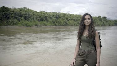 Ella Al-Shamahi, above in 'Jungle Mystery: Lost Kingdoms of the Amazon', says her predilection for working in dangerous regions is not the result of being an adrenaline junkie or wanting a stock of stories to tell at dinner parties: 'It's so much more than that.' Wild Blue Media / Marie-Claire Thomas