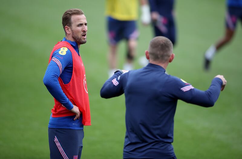 England's Harry Kane (left) with coach Graeme Jones during the training session at St George's Park, Burton upon Trent. PA