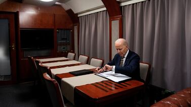 President Joe Biden checks his watch as he goes over his speech marking the one-year anniversary of the war in Ukraine after a surprise visit to meet with Ukrainian President Volodymyr Zelenskiy, Monday, Feb.  20, 2023, in Kyiv.  Evan Vucci / Pool via REUTERS