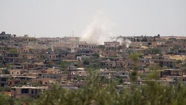 Smoke billows after shelling by Syrian government troops in the north-western town of Barah, in the rebel-held Idlib province, on June 21, 2021. AFP