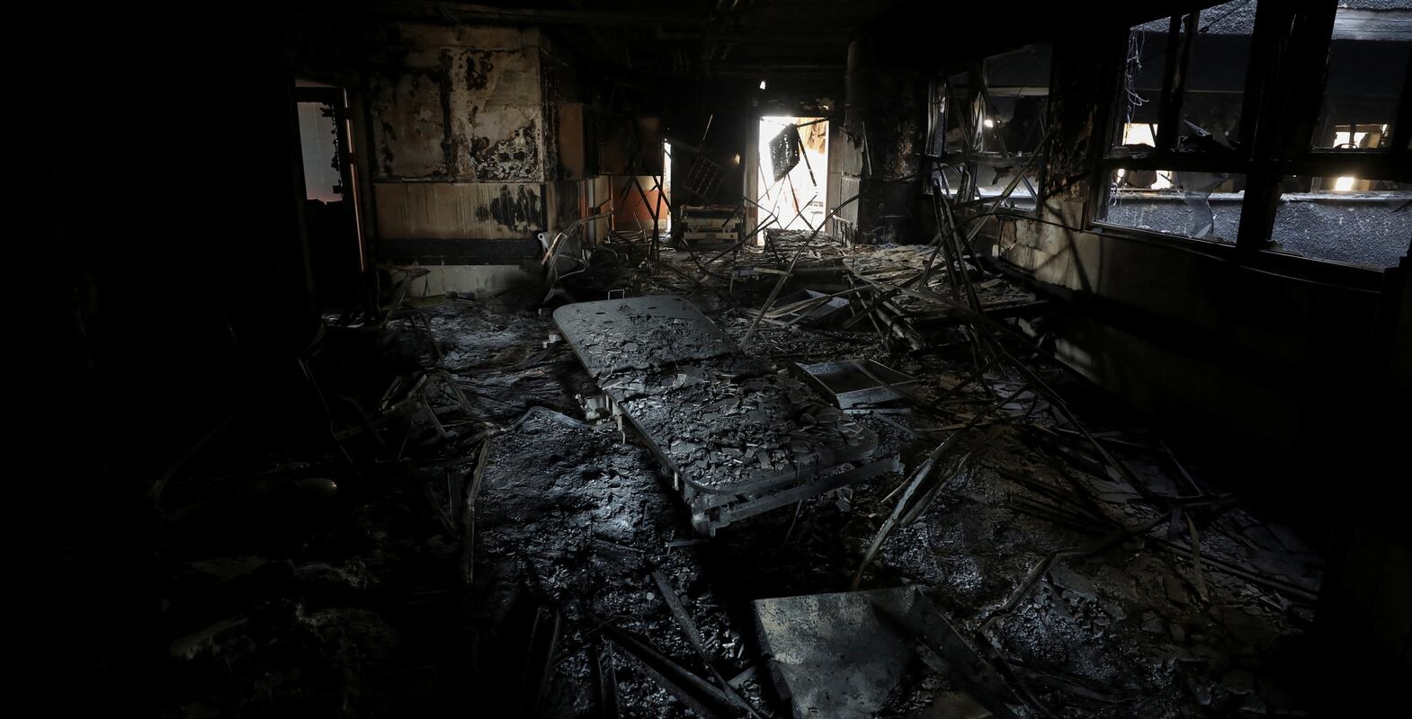 Burnt beds lie on the floor at Al Shifa Hospital after Israeli forces withdrew following a two-week operation. Reuters