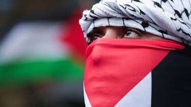 A pro-Palestinian activist in New York takes part in a protest to mark the 76th anniversary of The Nakba. AFP