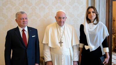 A handout picture provided by the Vatican Media shows Pope Francis (C) posing with King Abdullah II Ibn Al Hussein (L) and Queen Rania Al-Abdullah of Jordan during a private audience, in Vatican City, 10 November 2022. EPA